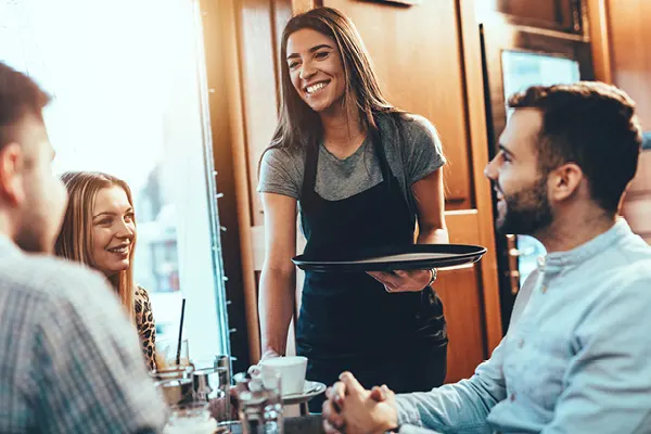 Waitress in Restaurant Serving Coffee Employees need to feel safe